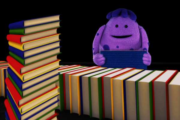 Abu llegint entre llibres
